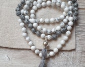 Mala meditation necklace made of precious stones (Howlite and Picasso Jasper). Guru pearl interchangeable with tassel.