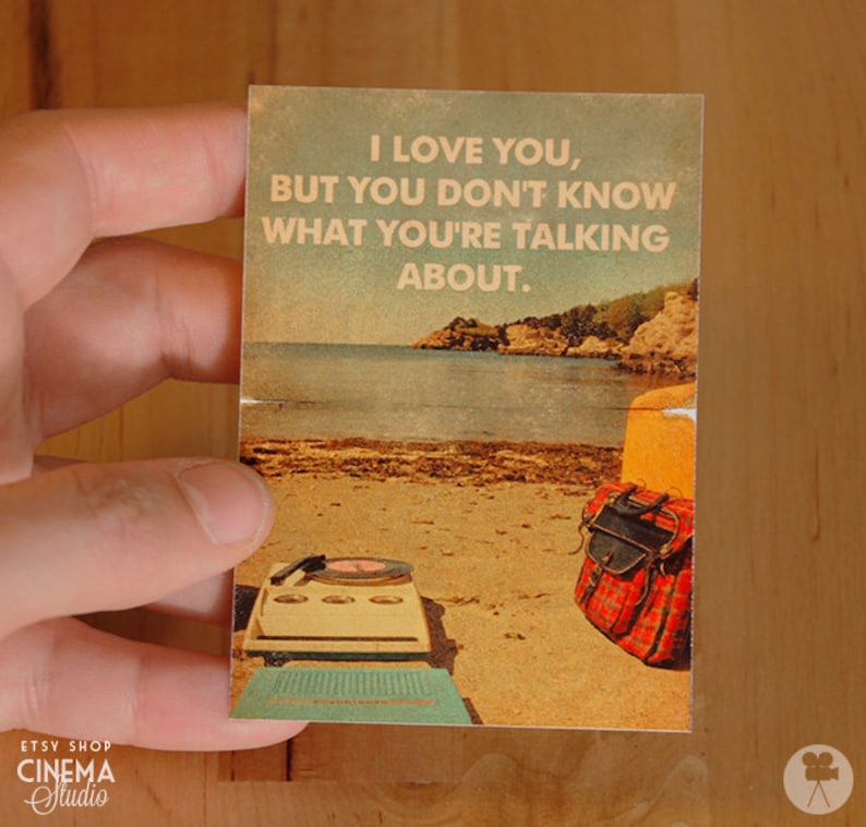 May include: A vintage-style postcard with a beach scene and the text "I love you, but you don't know what you're talking about."