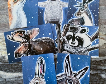 7 animal postcards under the snow