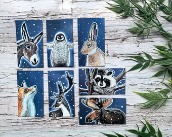 7 animal magnets under the snow