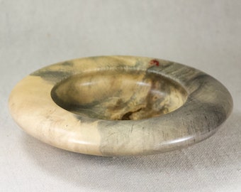 Enclosed bowl turned from Buckeye Burl
