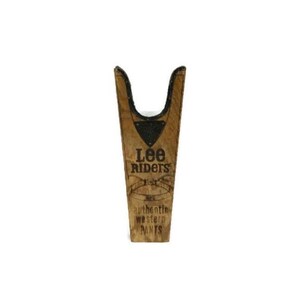 May include: A wooden boot jack with the text "Lee Riders" and "Authentic Western Pants" printed on it.
