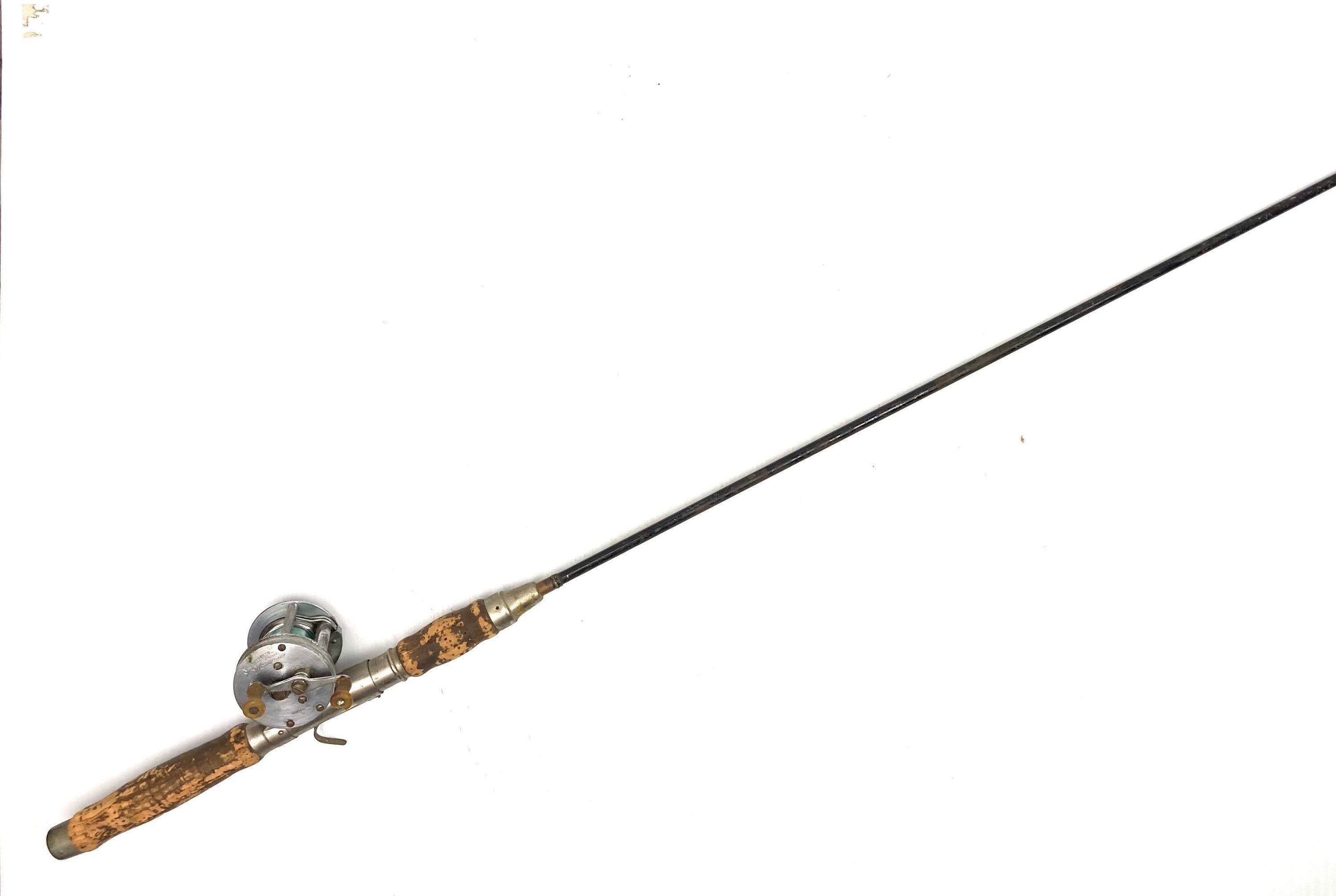 Sold at Auction: VINTAGE FISHING POLE ANTIQUE 1502