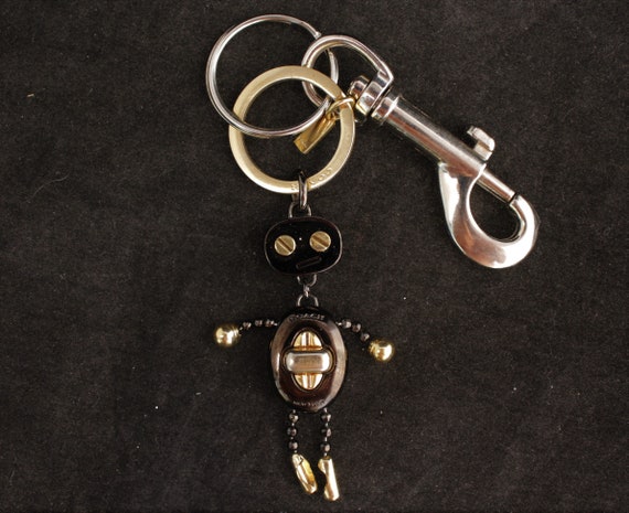 Vintage Original "Coach" Black & Gold Robot Metal