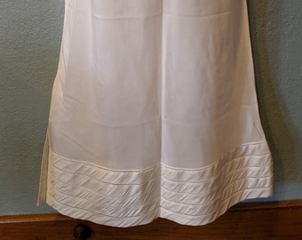 Beautiful Vintage Late 1950's Saramae Half Slip Size Petite  A Long slip w/ side slits and four panel Stitched bottom Accent