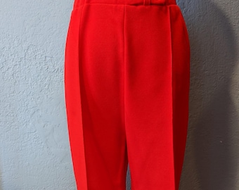 1970's Pykettes Polyester Knit Red Flared Pants w/sewn crease. Size 30 inch waist, 38 inch hip Pull on elastic waist Bell Bottoms