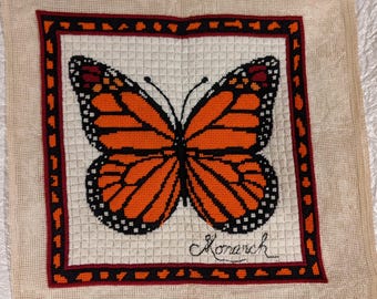 1970's Monarch Crewel Stitchery Finished w/ embroidered Monarch nameplate. Ready for framing.
