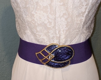 1980's Purple & Gold Tone Cinch Belt by Day-Lor Size Small Big Purple Buckle w/gold accents 24.5 inch long stretch to 29"