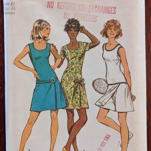 May include: Vintage Simplicity sewing pattern, number 9989, with illustrations of three women in dresses. The pattern includes the text "No Refund or Exchanges on Patterns". The bust size is 117 cm.
