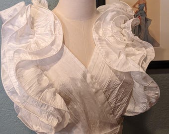 1985 Big Ruffled Shoulder Jumpsuit By B.B. Collections Size 12 White Crinkle Polyester Open back with string ties & cummerbund belt