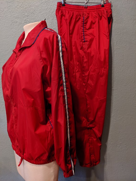 red white and blue jogging suit