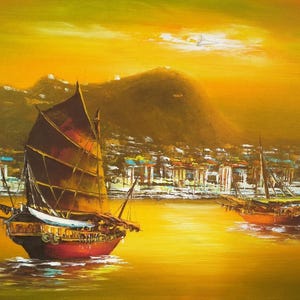 May include: Oil painting of two traditional sailboats on a golden sea, with a city and mountains in the background. The boats have dark red hulls and large brown sails, set against a warm, sunset-like sky.