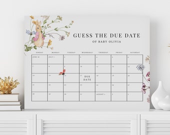 May include: A white calendar print with the text "GUESS THE DUE DATE OF BABY OLIVIA." The calendar features a bunny illustration and floral accents. The due date is marked on the 17th of the month.