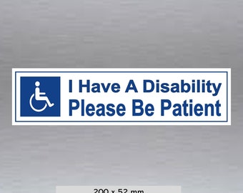May include: White sign with a blue wheelchair symbol and the text "I Have A Disability Please Be Patient" in blue lettering. The sign measures 200 x 52 mm.