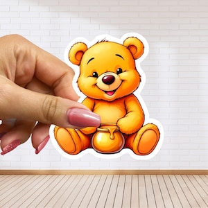A honey-loving bear sticker with a big pot of golden goodness vinyl decal 72 x 80 mm  (2.9 x 3.2 inches)