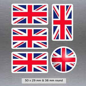 May include: A set of Union Jack stickers in different shapes, including rectangular and circular. The stickers display the red, white, and blue design of the British flag. Sizes include 50 x 29 mm and a 36 mm round sticker.