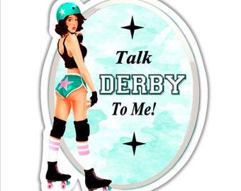 May include: A roller derby girl wearing a black tank top, teal shorts with a pink star, and pink and white striped knee pads. She is on roller skates and has a teal helmet on. The background is a teal and white watercolor design with the text "Talk Derby To Me!" in black.