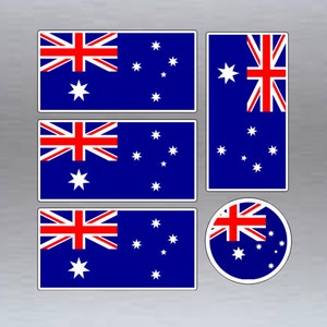 May include: Set of four Australian flag stickers in different shapes and sizes. The stickers are blue, red, and white with a Union Jack in the top left corner and a constellation of stars in the bottom right corner.