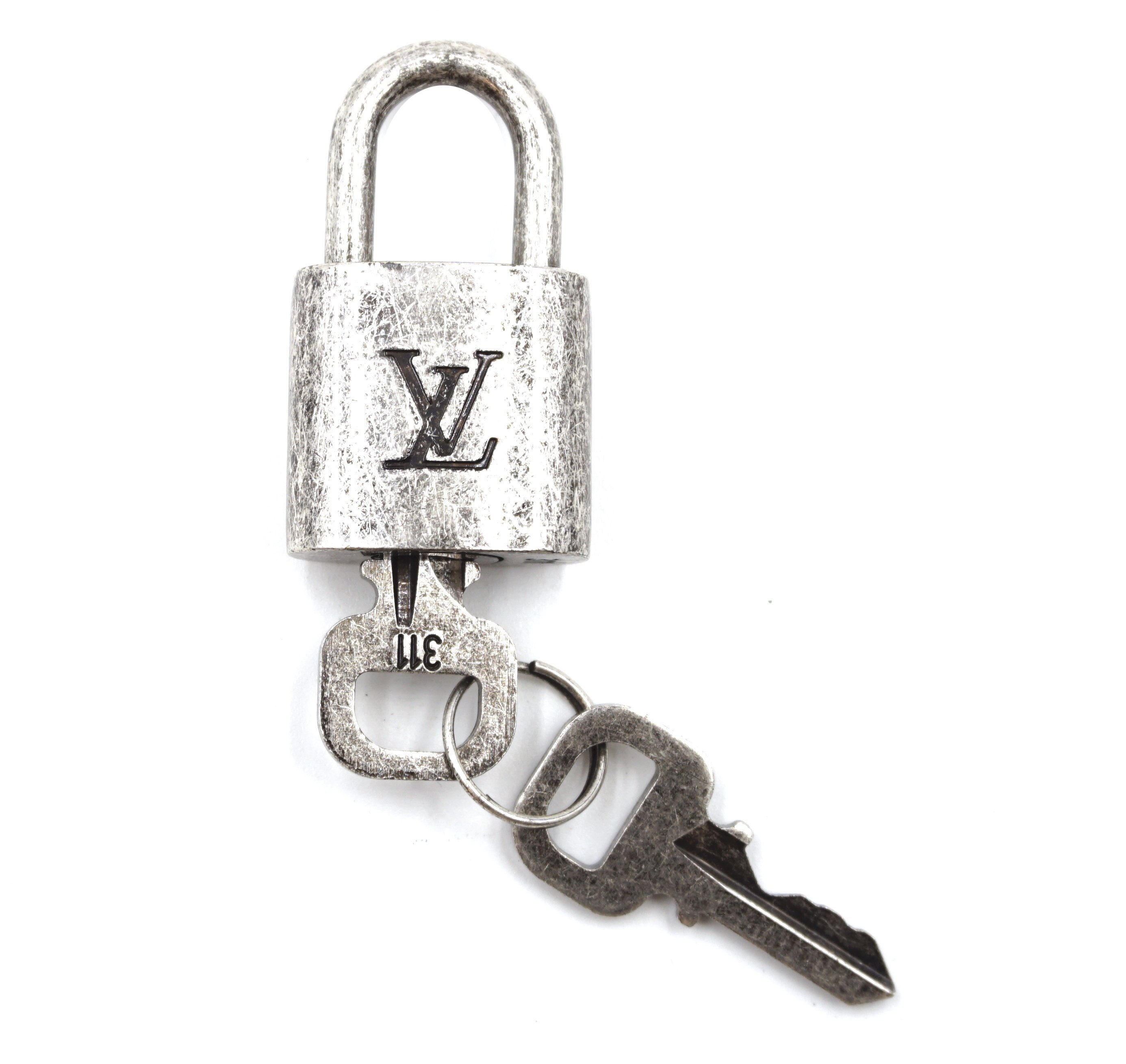 vuitton silver lock and