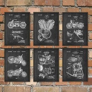 May include: Set of six black and white vintage motorcycle patent prints. Each print features a different motorcycle design with text and illustrations. The prints are framed and ready to hang.