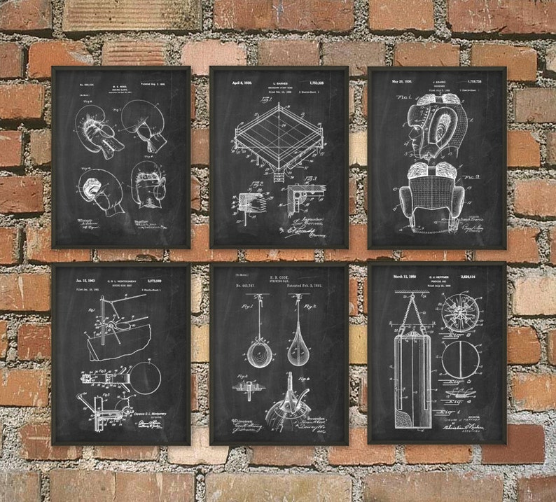 May include: Six framed black and white boxing patent prints. The prints feature detailed diagrams of boxing gloves, a boxing ring, headgear, a speed bag, a double-end bag, and a heavy bag. The prints are displayed against a brick wall.