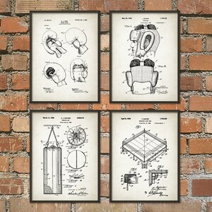 May include: Four vintage black and white patent drawings for boxing equipment. The drawings show a boxing glove, a boxing helmet, a punching bag, and a boxing ring. The drawings are on a white background with black lines.