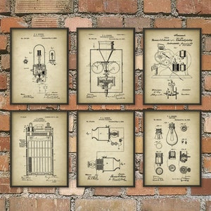 May include: Set of six vintage patent prints featuring black and white illustrations of electrical inventions. The prints are framed in black and have a white background. The text on the prints includes the patent number, inventor's name, and date.