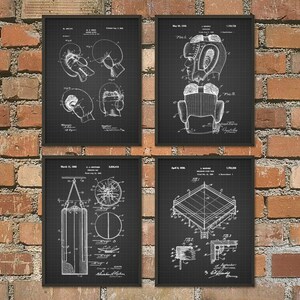 May include: Set of four black and white vintage boxing patent prints. The prints feature illustrations of boxing gloves, a boxing head guard, a punching bag, and a boxing ring. Each print includes the patent number, date, and inventor's name.