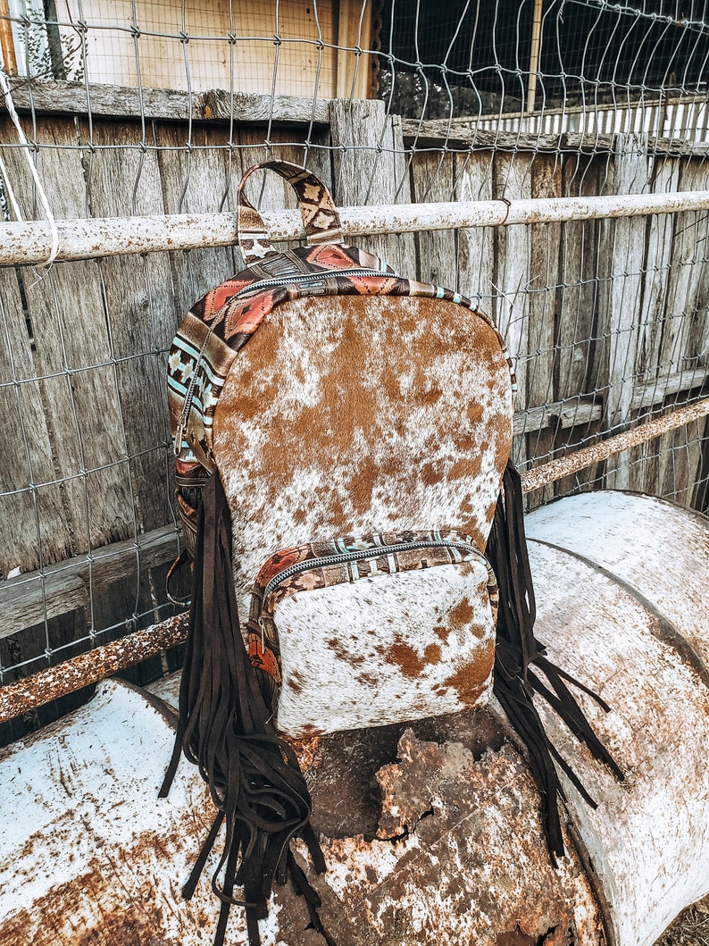 cowhide backpack with fringe