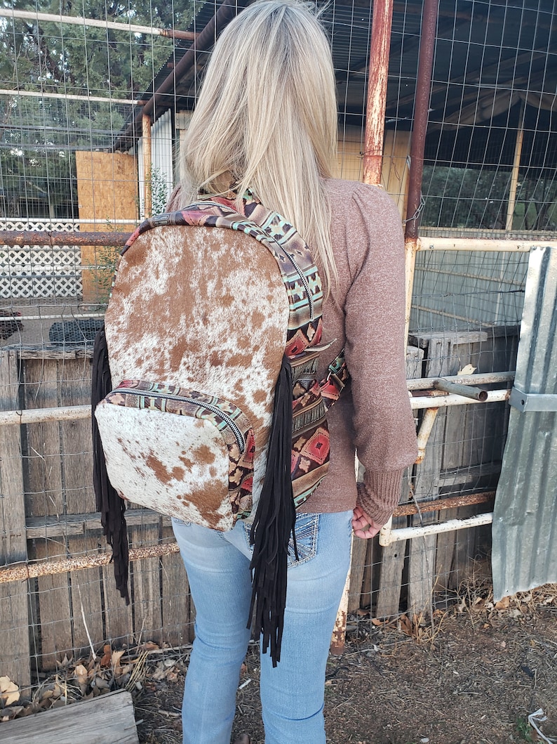 cowhide backpack with fringe