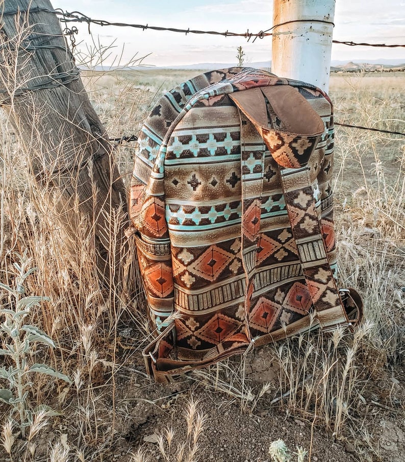 cowhide backpack with fringe