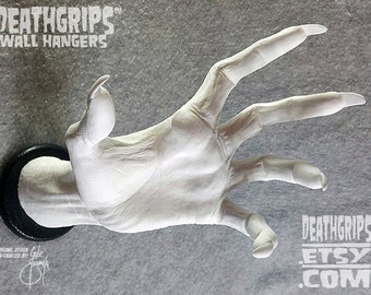 White WITCH DEATHGRIPS™ Wall Hanger for guitars and other items. By Gabe Escamilla Left Hand Wall-Mount Display