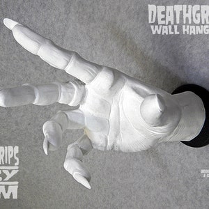 White Vampire/Dracula/Wizard DEATHGRIPS™ Wall Hanger for guitars and other items. Right Hand. By Artist Gabe Escamilla