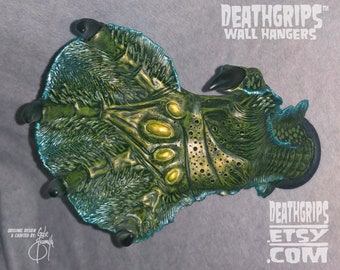 Right LAGOON CREATURE DEATHGRIPS™ Wall Hanger for guitars and other items. By Gabe Escamilla