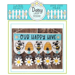 May include: Wooden sign with the text "OUR HAPPY HIVE" and illustrations of bees and beehives. Below are daisy-shaped ornaments with bows. The sign is designed with a light blue and white color scheme, and is ready for laser cutting.