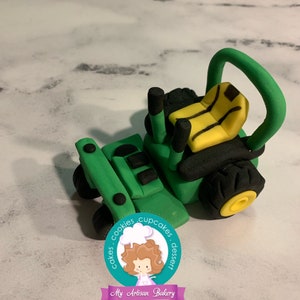 Lawn mower inspired fondant cake topper