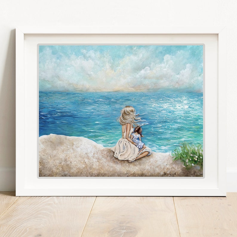 blonde mom brown hair daughter sitting on beach family love coastal wall art Bild 5