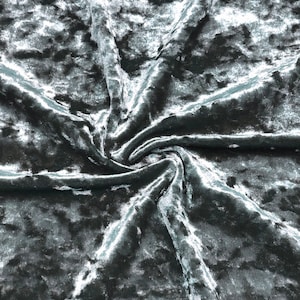 May include: Close-up of a charcoal crushed velvet fabric with a subtle sheen. The fabric is soft and luxurious, with a slightly textured surface.