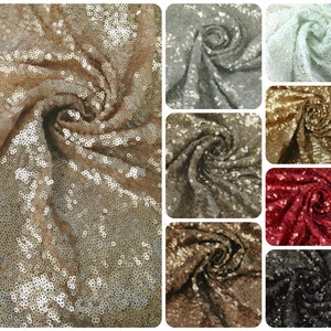 May include: A collage of nine fabric swatches featuring different colors of sequined fabric. The swatches are arranged in a grid pattern, with each swatch showing a close-up of the fabric's texture. The colors include gold, silver, white, red, black, and brown.