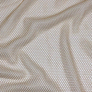 May include: A close-up of a gold mesh fabric with a fine, even weave. The fabric is soft and pliable, with a subtle sheen.
