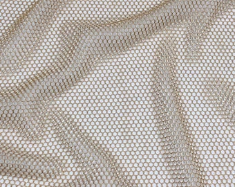 May include: A close-up of a gold mesh fabric with a fine, even weave. The fabric is soft and pliable, with a subtle sheen.