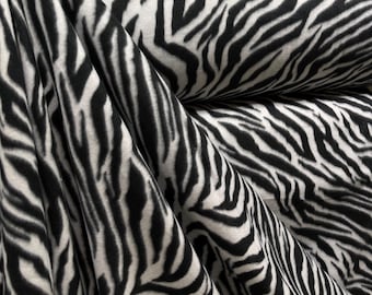 Stampa esotica a strisce zebrate bianche e nere su pile accogliente / Tessuto per noi /