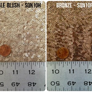 May include: Two swatches of sequin fabric, one in pale blush and one in bronze, with a penny placed on each for scale. The fabric is labeled "Pale Blush - SQN10H" and "Bronze - SQN10F".