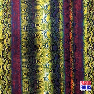 May include: A fabric with a snakeskin pattern in shades of yellow, green, red, and blue. The pattern is repeated in vertical stripes.