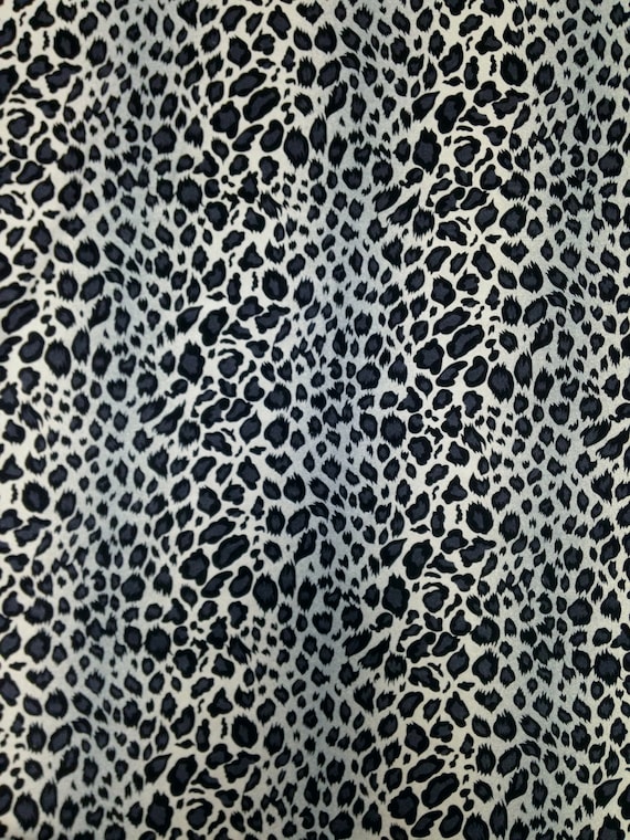 Pale Turquoise Leopard Animal Print on Stretch Nylon Spandex Tricot Fabric