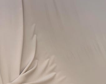 NUOVO splendido tessuto in maglia di poliestere e spandex beige leggero e liscio al tatto / Tessuto per noi /