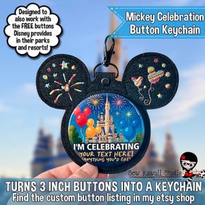 May include: A black glittery Mickey Mouse-shaped keychain holder featuring a central circular button with a castle illustration, fireworks, and balloons. The text reads: I'M CELEBRATING YOUR TEXT HERE! ANYTHING YOU'D LIKE. It holds 3 inch buttons.