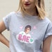 Carly Tonner reviewed Louis Theroux BAE tee