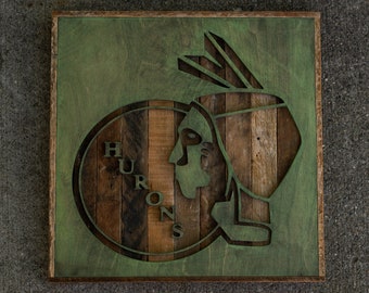 eastern michigan university hurons logo on salvaged wood