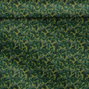 May include: A fabric with a repeating pattern of dark green leaves and smaller white flowers on a yellow-green background. The leaves have a detailed, realistic appearance, creating a natural, botanical theme.